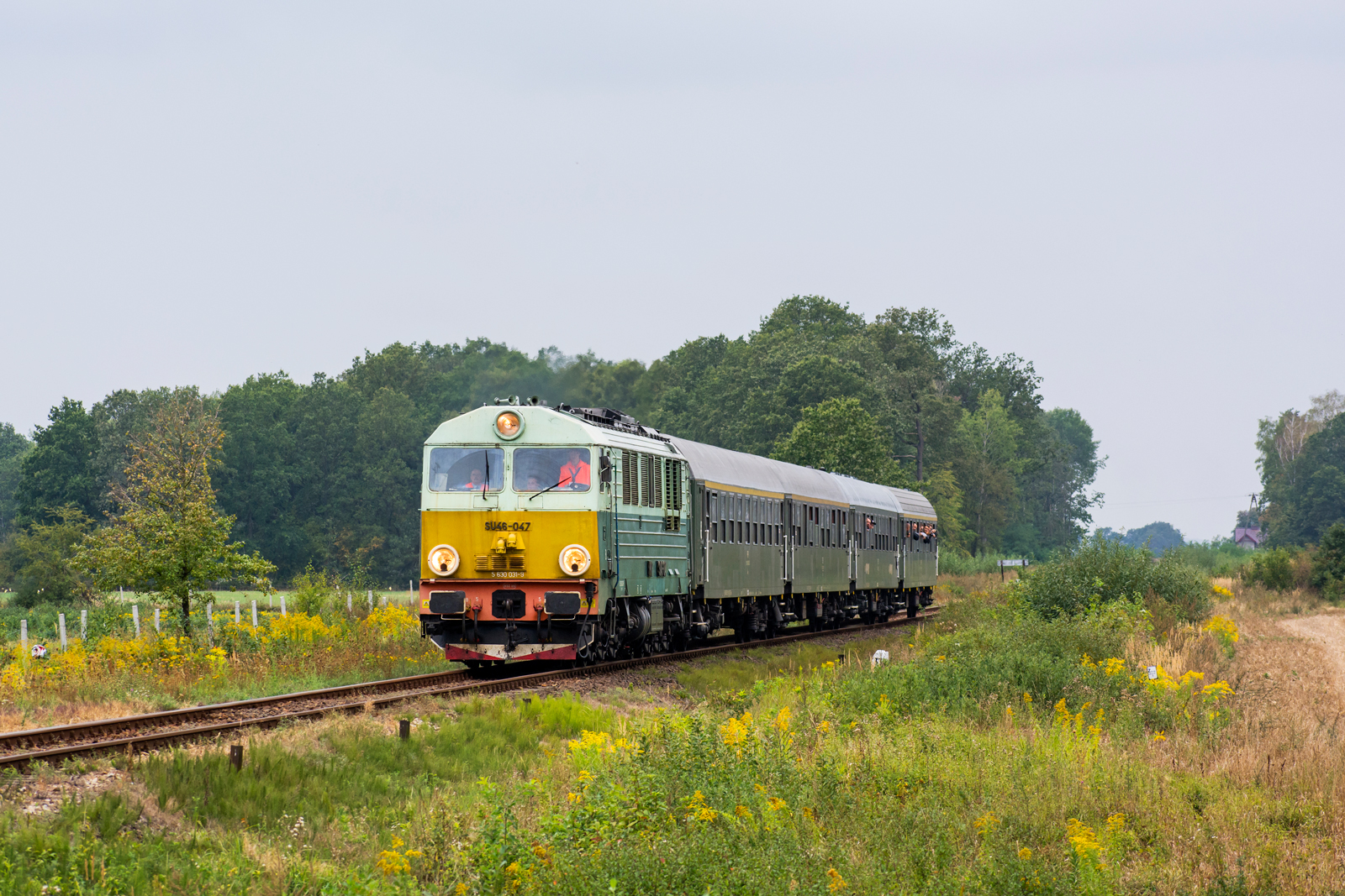 SU46-047