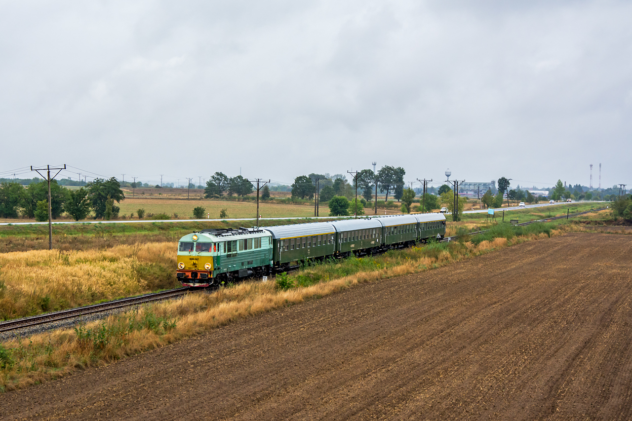 SU46-047