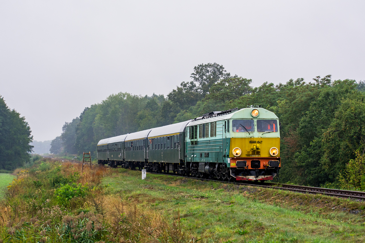 SU46-047